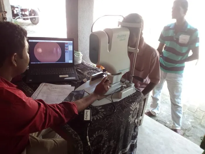 Mobile diagnostic screening equipment in use at a Sri Sathya Sai Aarogya Vahini camp