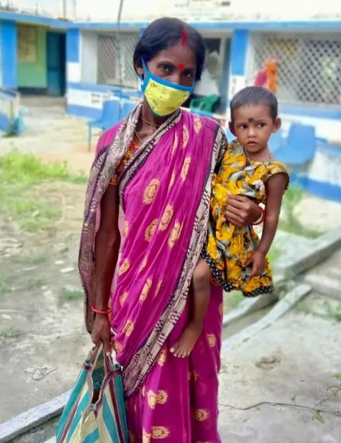 A mother and child in the communities served by Aarogya Vahini's nutrition programme